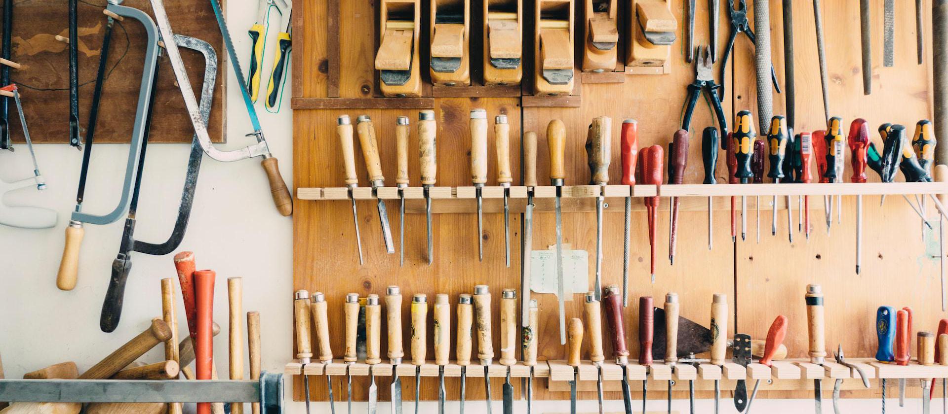 Image of tools hanging ready on the wall.