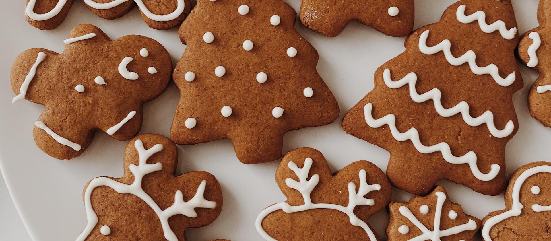 Image of brown cookies on white ceramic plate.