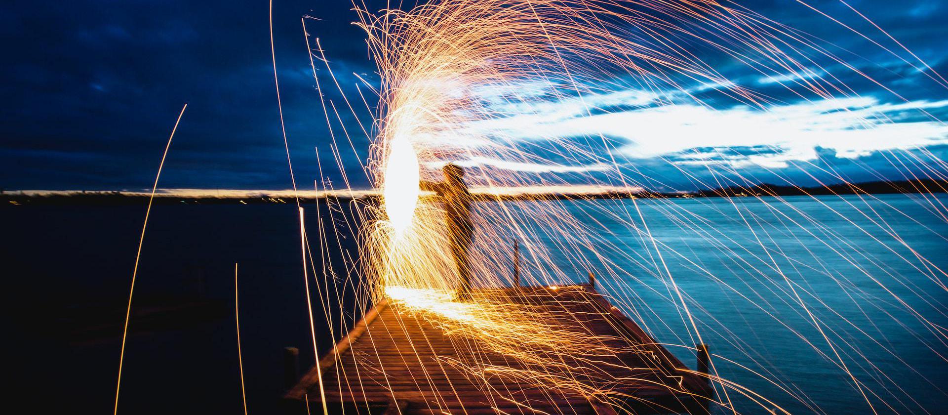Sparks fly as a person puts some steelwhool to good use in Frederikssund, Denmark