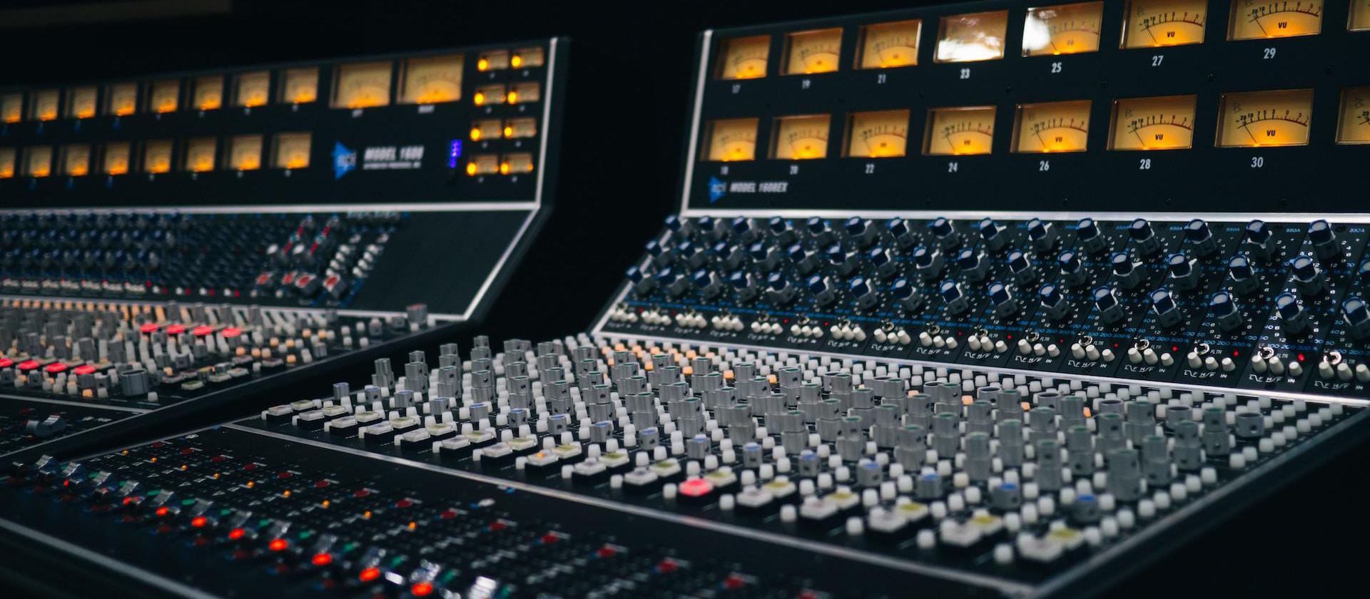 Image of two black audio mixers.