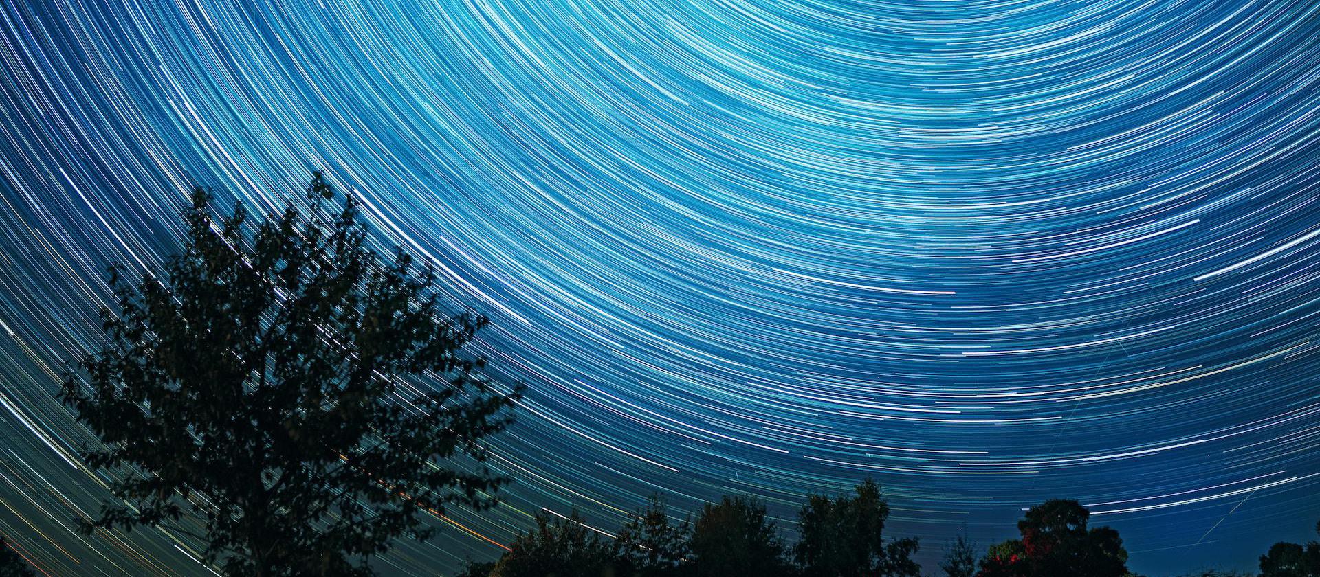 time lapse photography of stars during night time