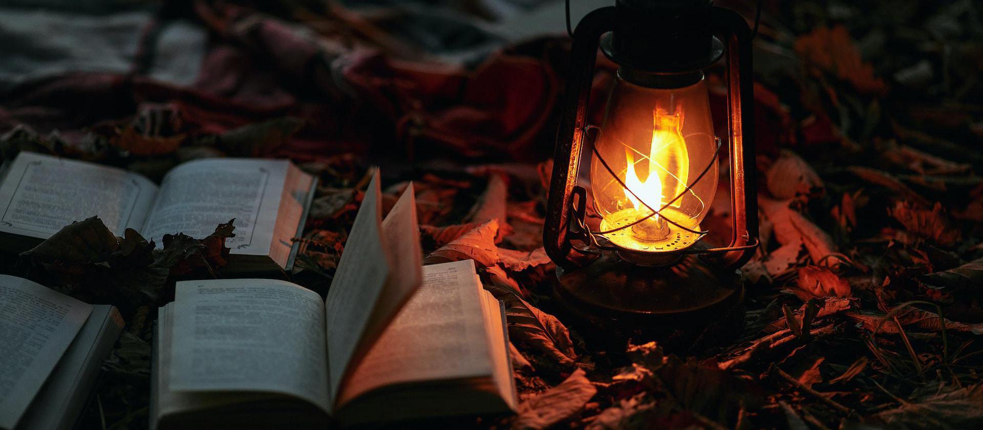 lantern next to old books